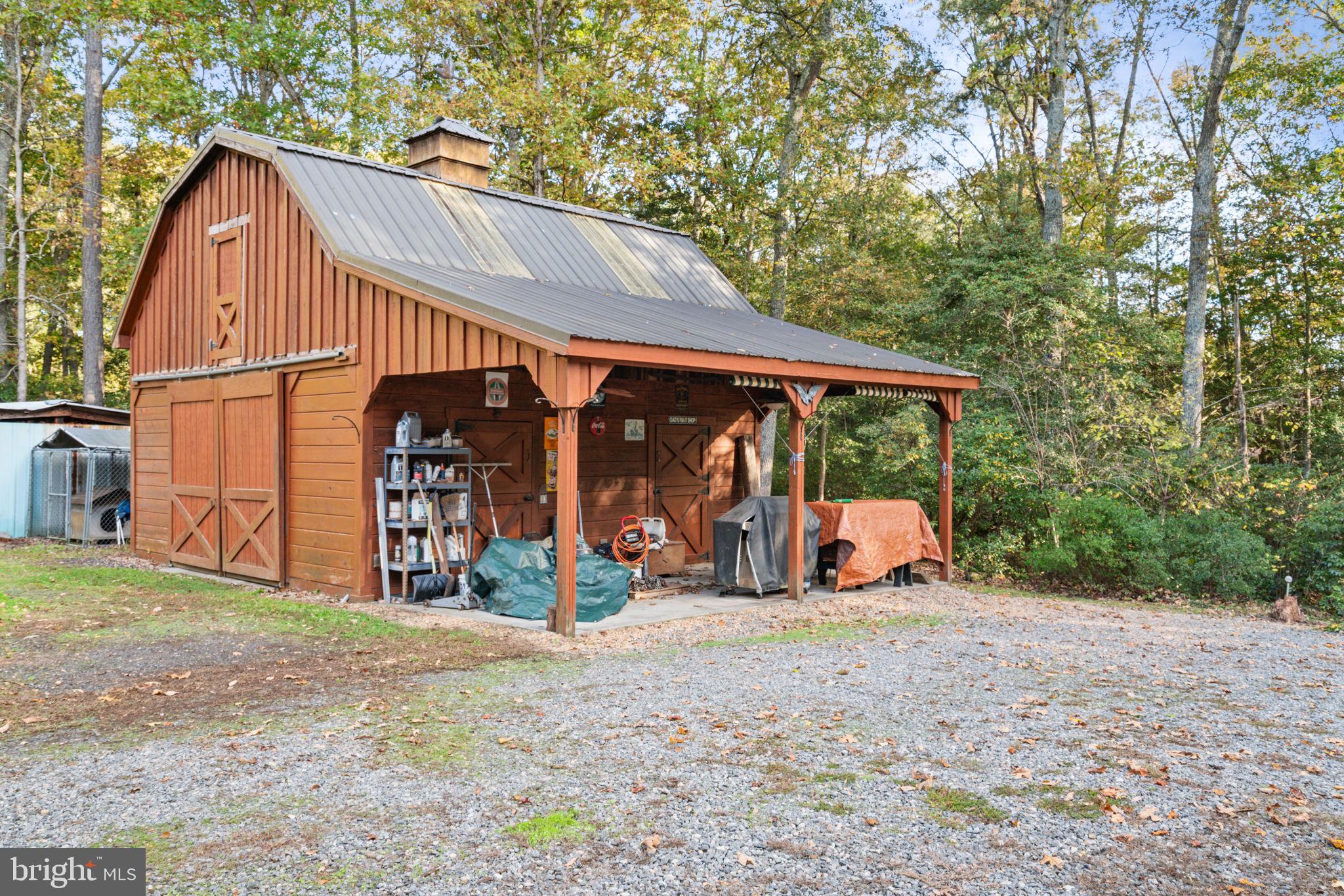 14760 Peach Tree Lane King George, VA 22485 - Photo 5 of 40 a view of a house with a yard