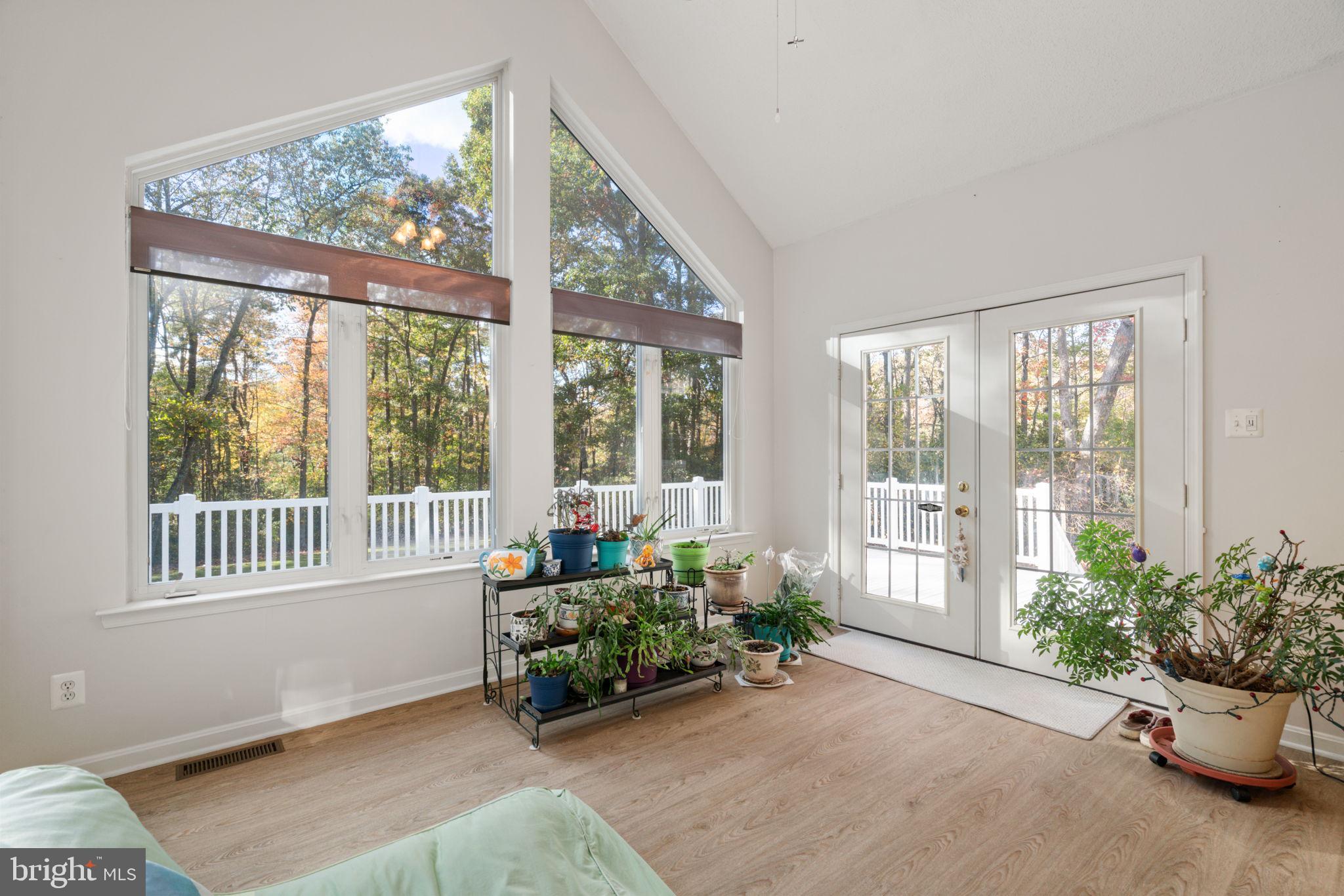 14760 Peach Tree Lane King George, VA 22485 - Photo 9 of 40 a living room with furniture and windows
