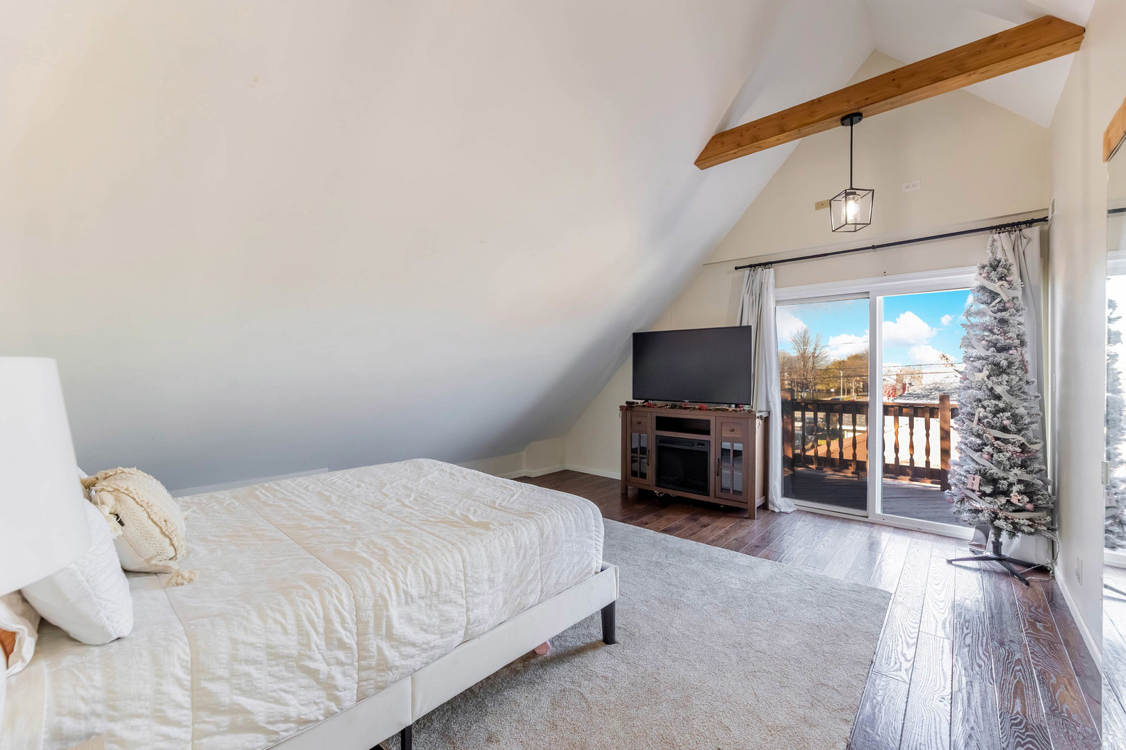 6358 South Keeler Avenue Chicago, IL 60629 - Photo 12 of 25 a spacious bedroom with a bed and a flat screen tv