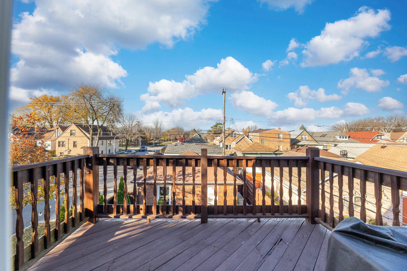 6358 South Keeler Avenue Chicago, IL 60629 - Photo 13 of 25 a view of a balcony with wooden floor