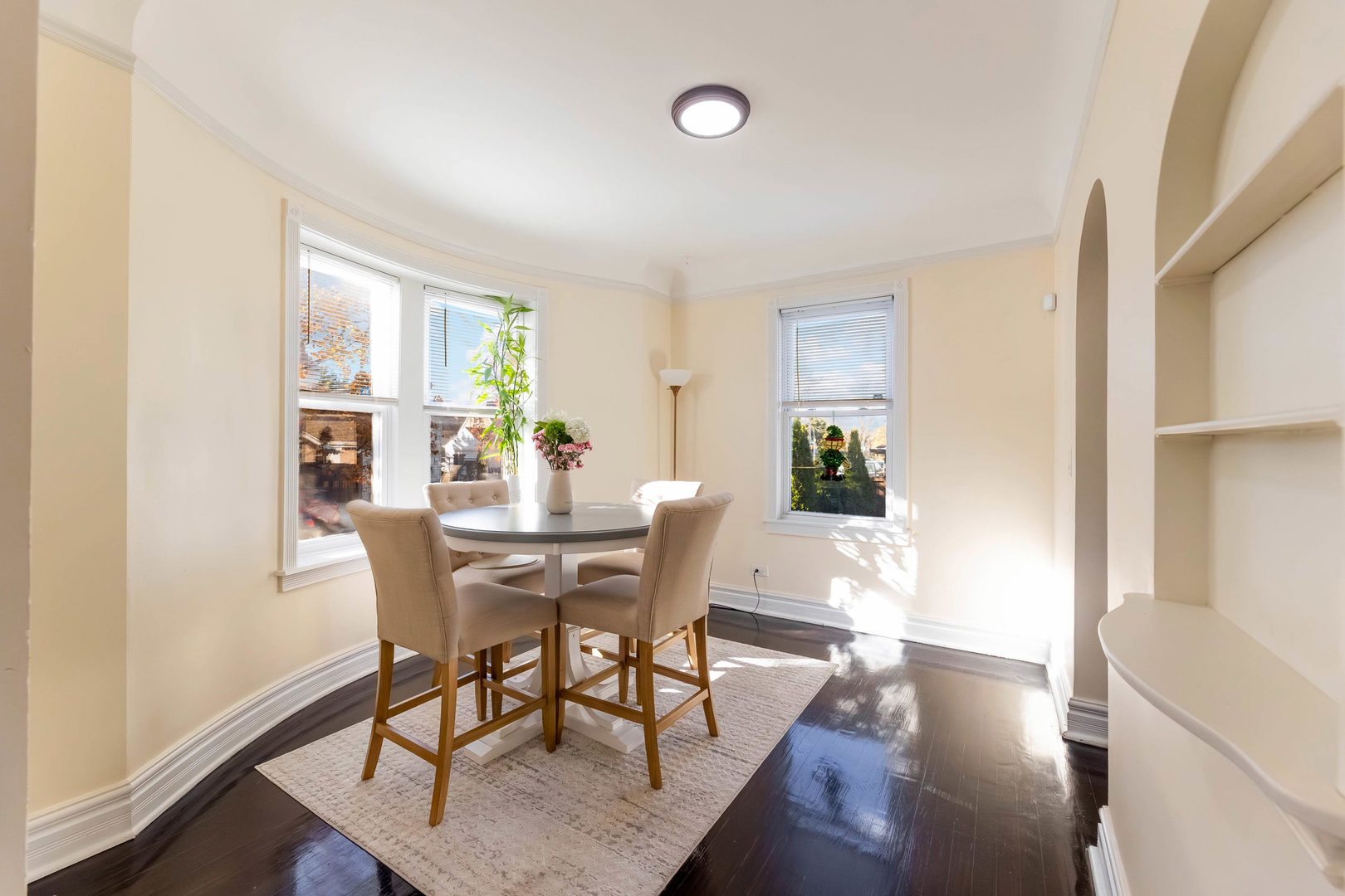 6358 South Keeler Avenue Chicago, IL 60629 - Photo 7 of 25 a view of a dining room with furniture and wooden floor