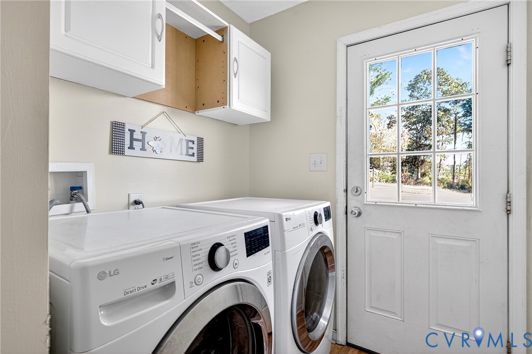 1611 Howerton Road Dunnsville, VA 22454 - Photo 18 of 36 a utility room with dryer and washer