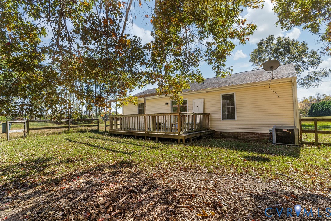 1611 Howerton Road Dunnsville, VA 22454 - Photo 25 of 36 a house view with a backyard space