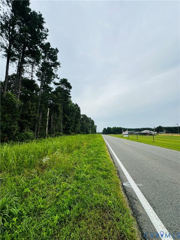 1611 Howerton Road Dunnsville, VA 22454 - Photo 36 of 36 a view of a lake with a big yard