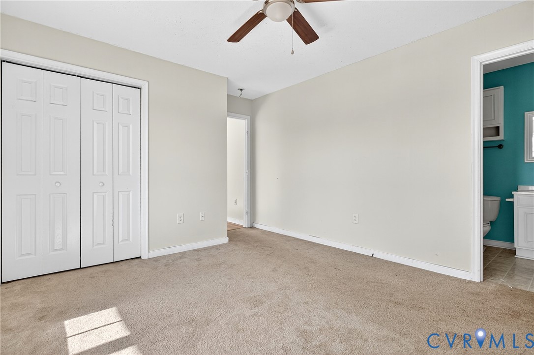 1611 Howerton Road Dunnsville, VA 22454 - Photo 7 of 36 a view of an empty room