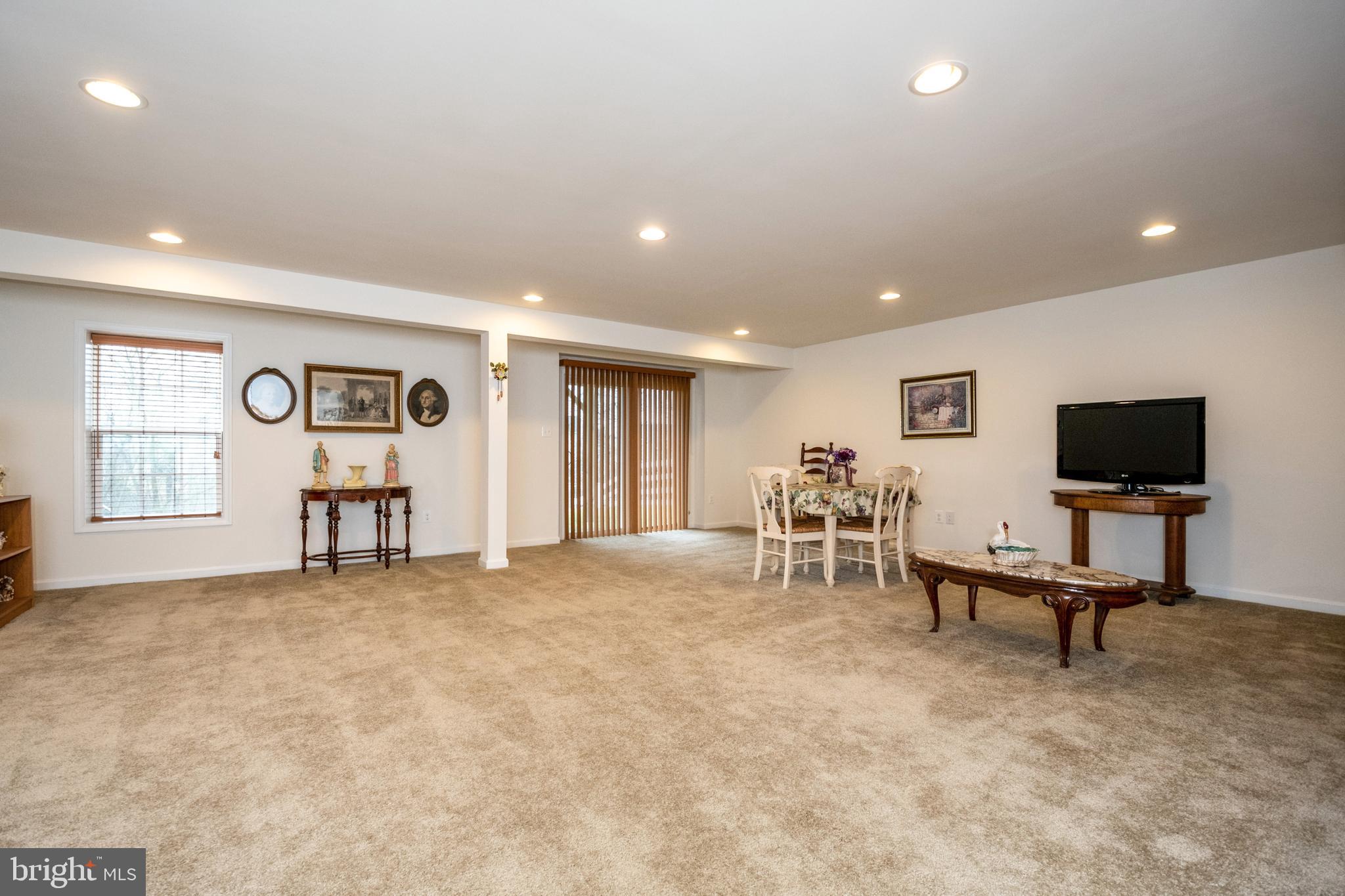 119 Rooftop Court Stephenson, VA 22656 - Photo 34 of 36 family room with door to outside