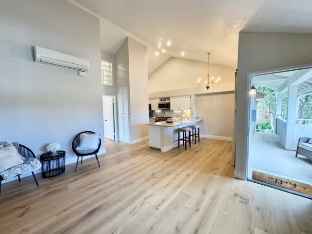 a room with furniture and wooden floor