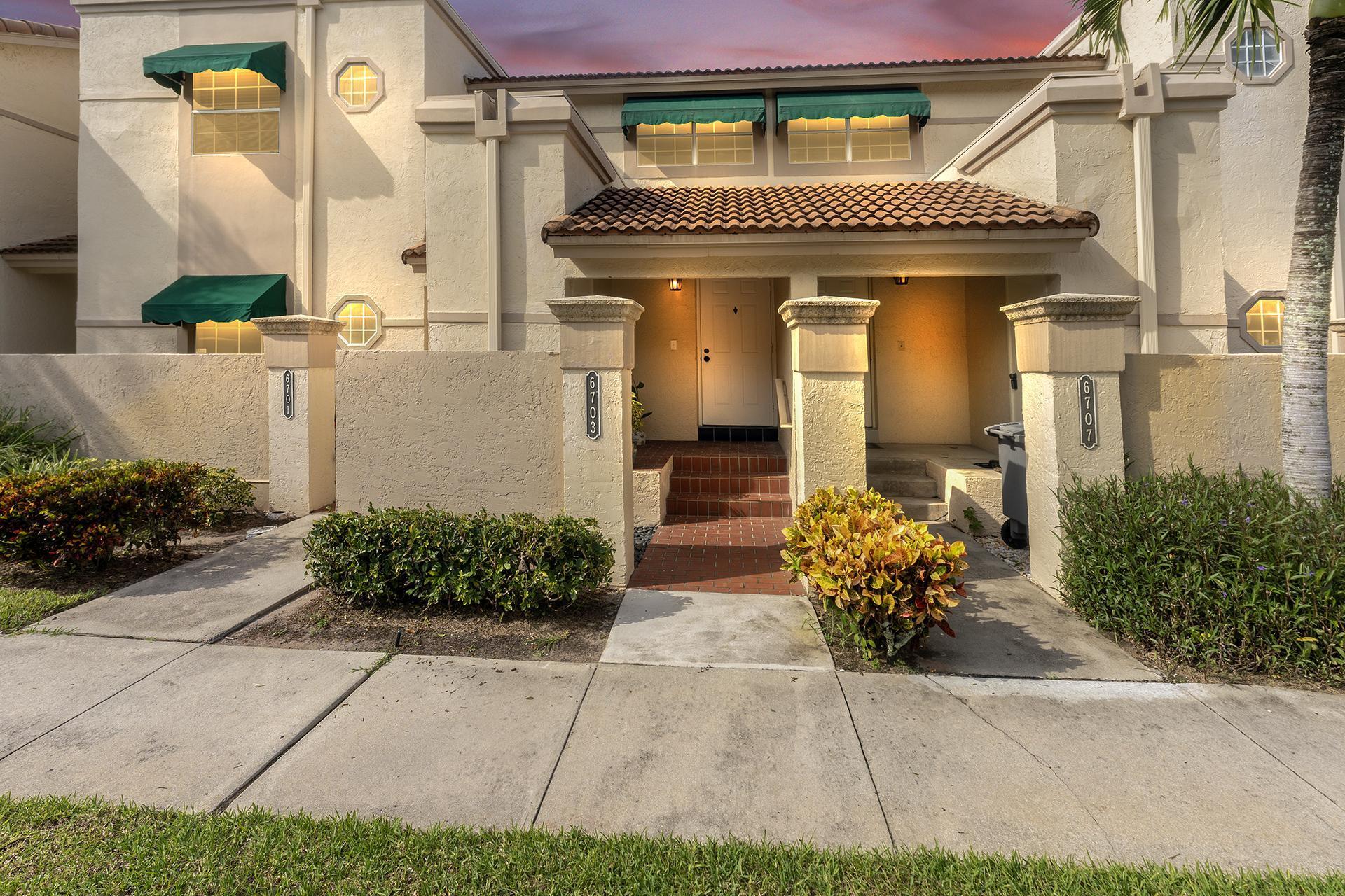 6703 Via Regina Boca Raton, FL 33433 - Photo 1 of 37 Evening Front View