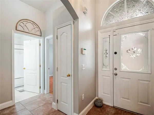 a view of a bathroom from a hallway