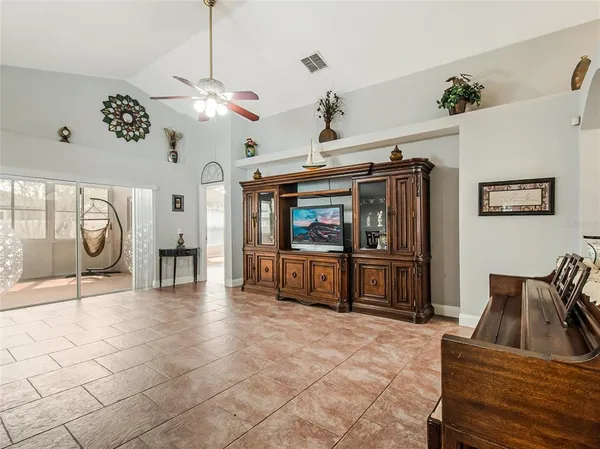 a kitchen with stainless steel appliances a stove sink microwave and cabinets