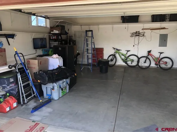 a view of a storage room with furniture