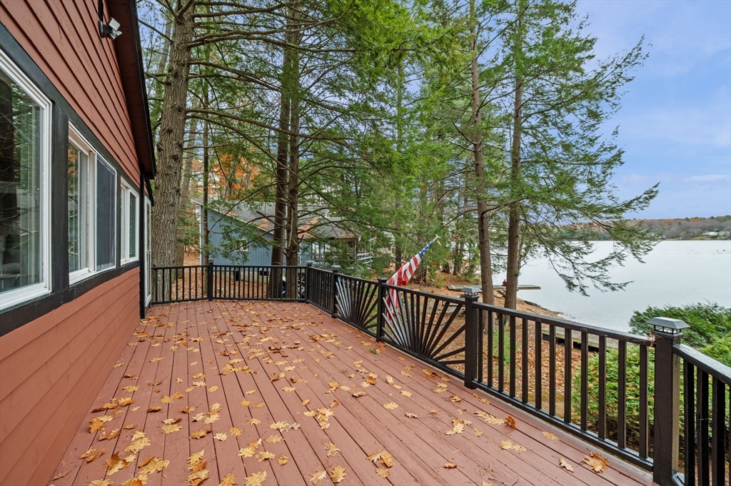 288 Pinkham Road Middleton, NH 03887 - Photo 14 of 42 a view of balcony with wooden floor and fence