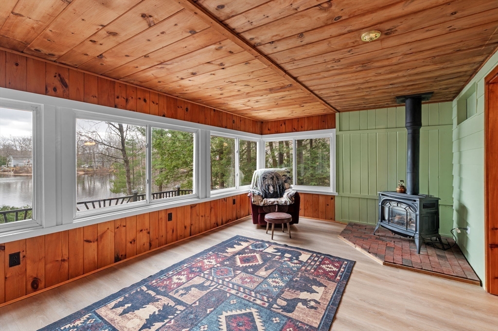 288 Pinkham Road Middleton, NH 03887 - Photo 22 of 42 a outdoor space with furniture and wooden floor