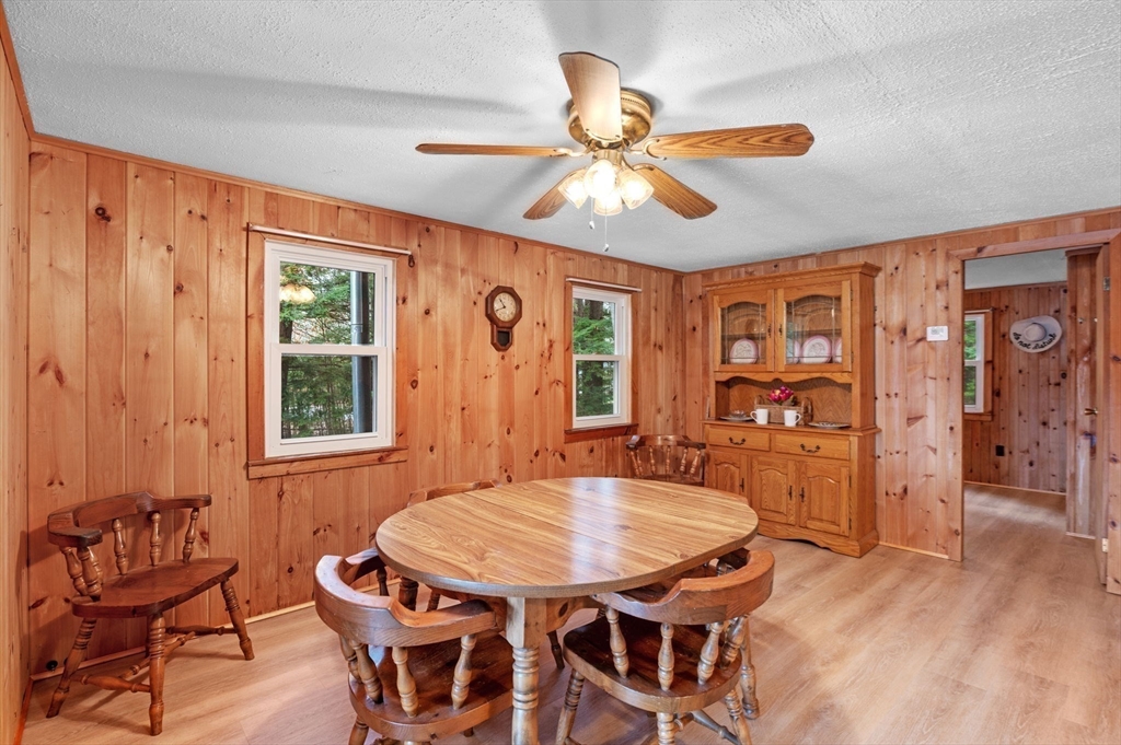 288 Pinkham Road Middleton, NH 03887 - Photo 26 of 42 a dining room with furniture and window