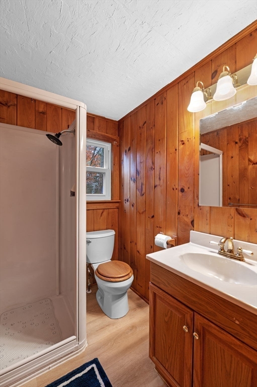 288 Pinkham Road Middleton, NH 03887 - Photo 34 of 42 a bathroom with a toilet a sink and a mirror