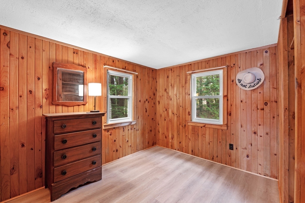 288 Pinkham Road Middleton, NH 03887 - Photo 36 of 42 wooden floor in an empty room