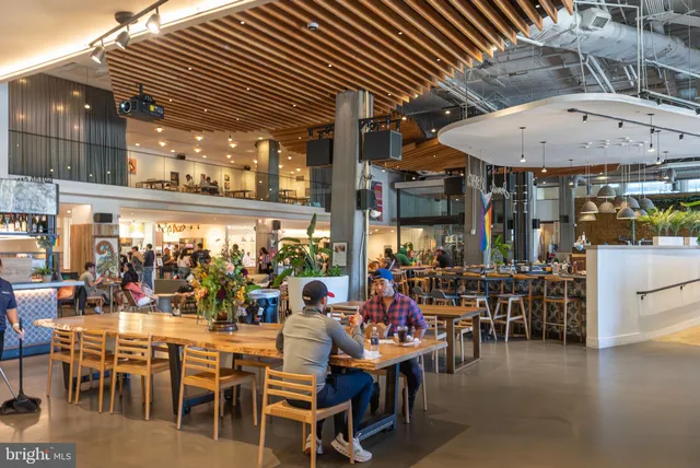 a view of a building with sitting area