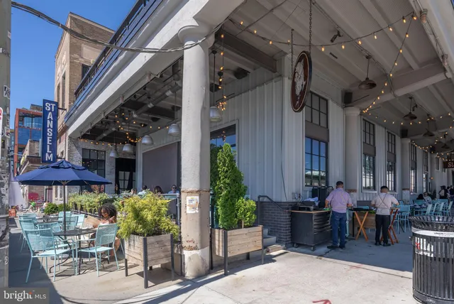 a view of street with sitting area