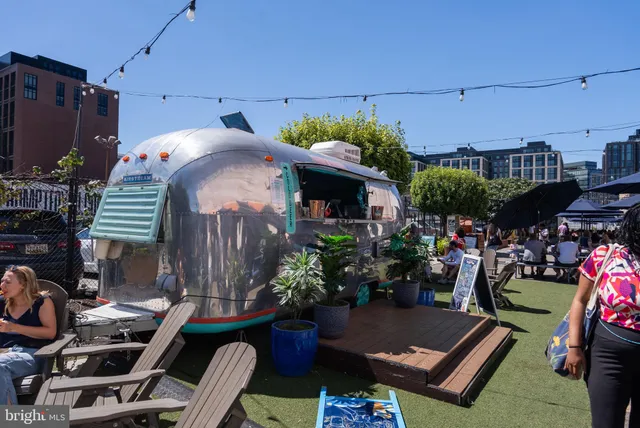 a view of a chairs and tables in patio