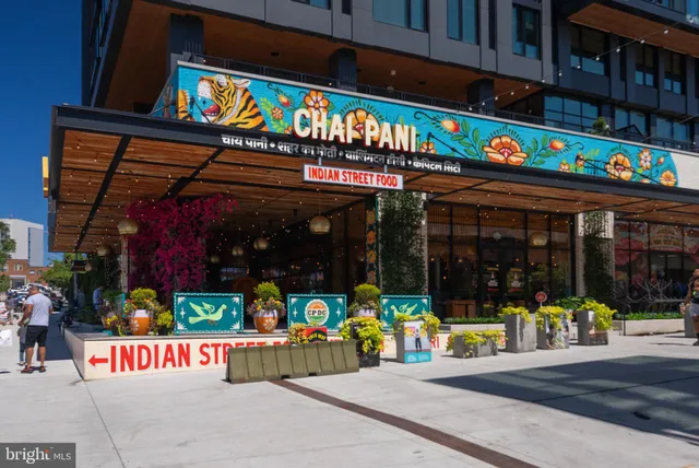 a view of a building with sitting area