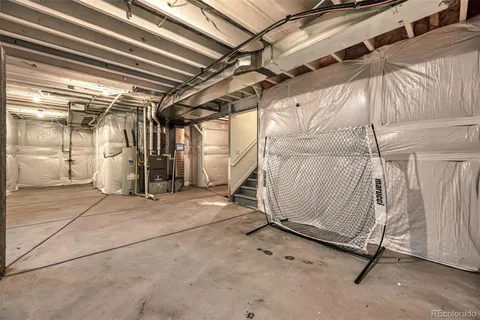 a view of a room with wooden walls