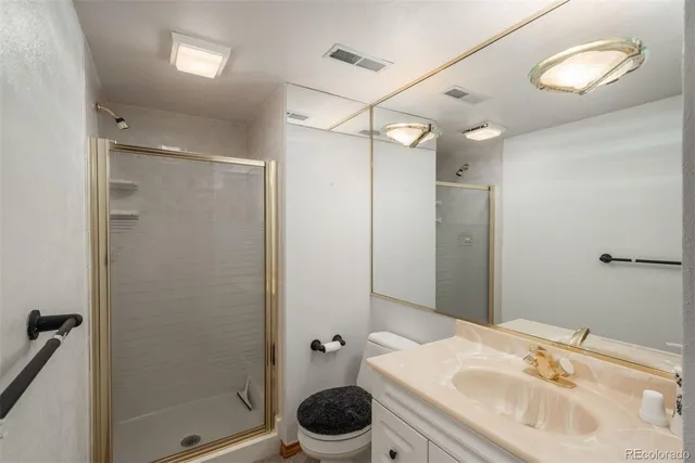 a view of a kitchen with cabinets