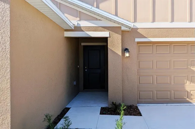 a view of a entryway door front of house
