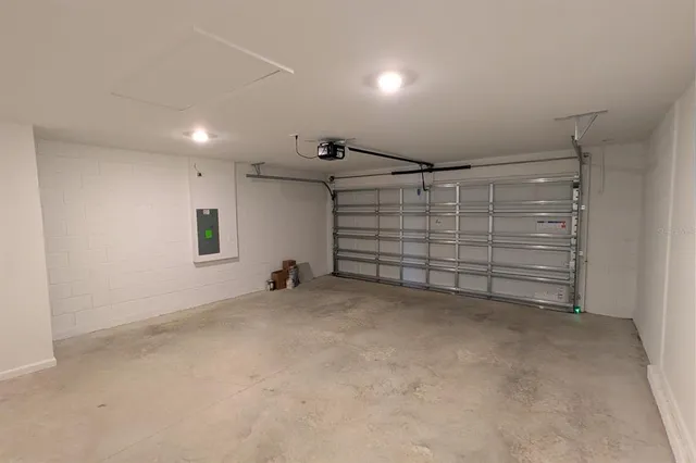 a view of an empty room with storage