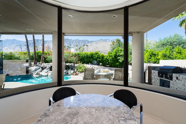 a spacious bathroom with a bathtub and shower