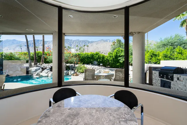 a spacious bathroom with a bathtub and shower