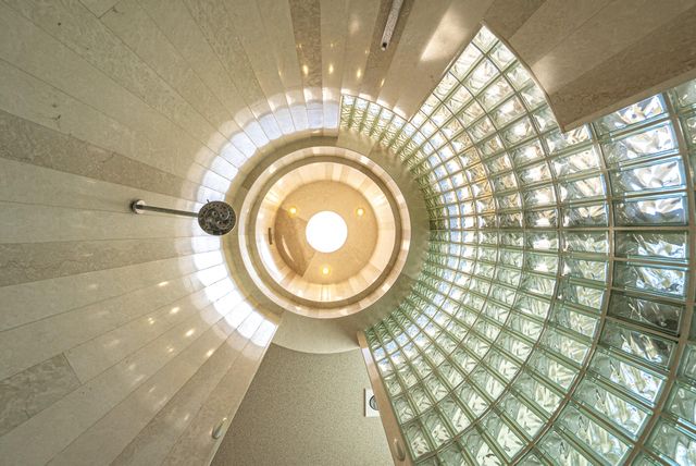 a room with a sink and cabinets