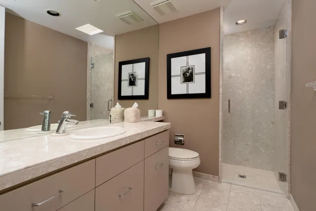 a view of a chairs and table in backyard