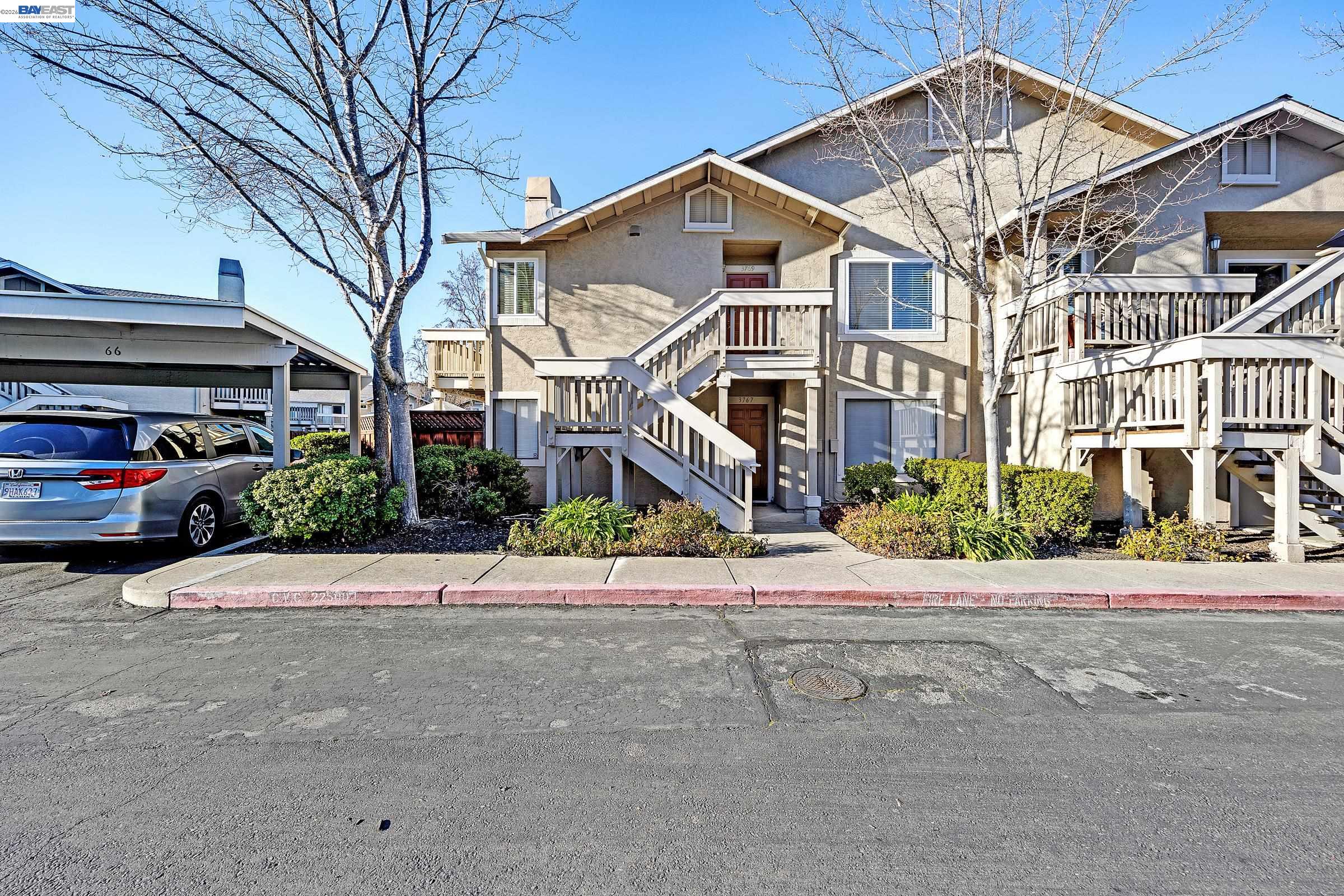 3769 Crow Canyon Road San Ramon, CA 94582 - Photo 4 of 56 a front view of a building with a garden and parking space