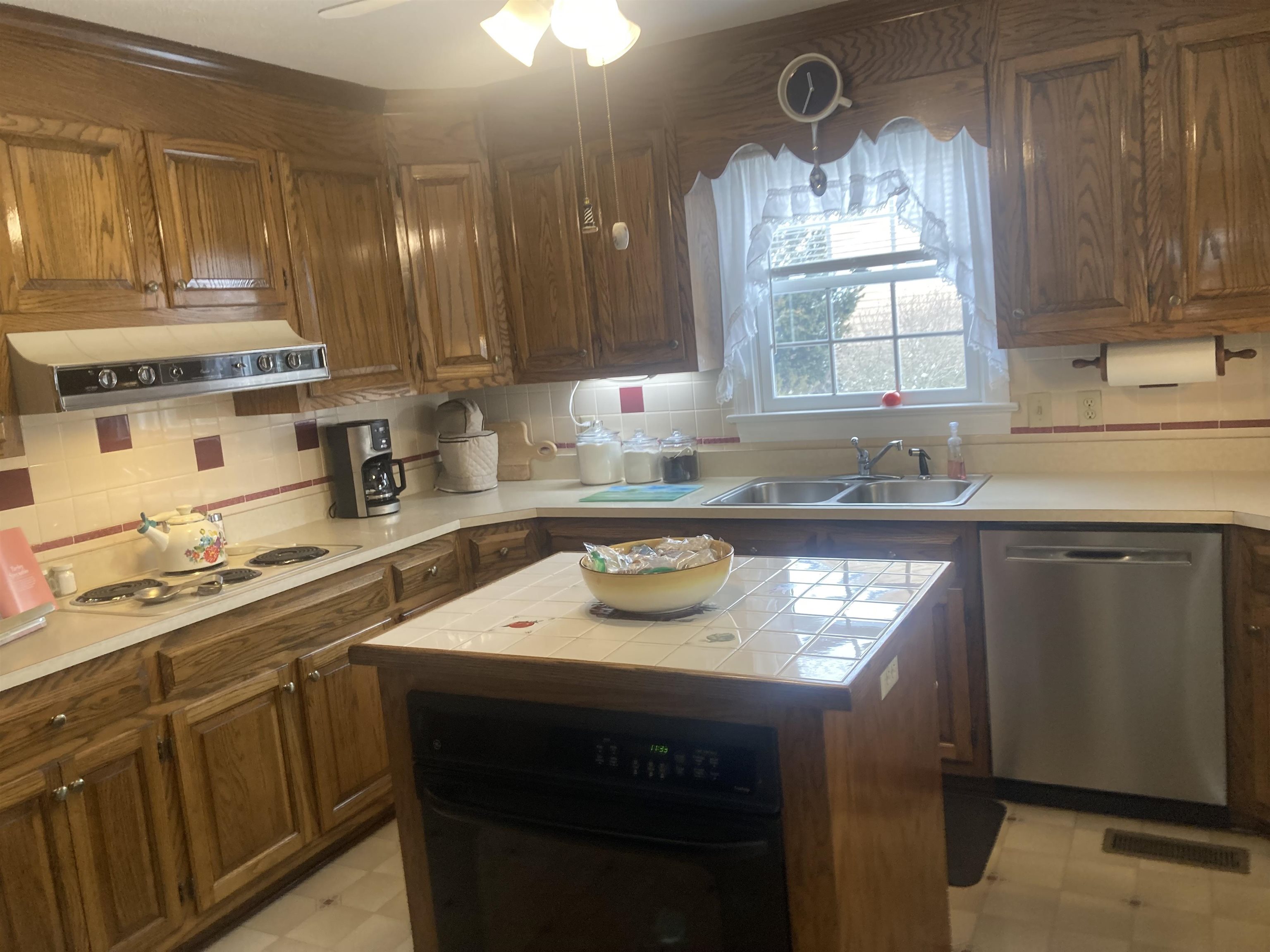 36 Spring Court Waynesboro, VA 22980 - Photo 19 of 72 a kitchen with kitchen island granite countertop a sink stainless steel appliances and cabinets