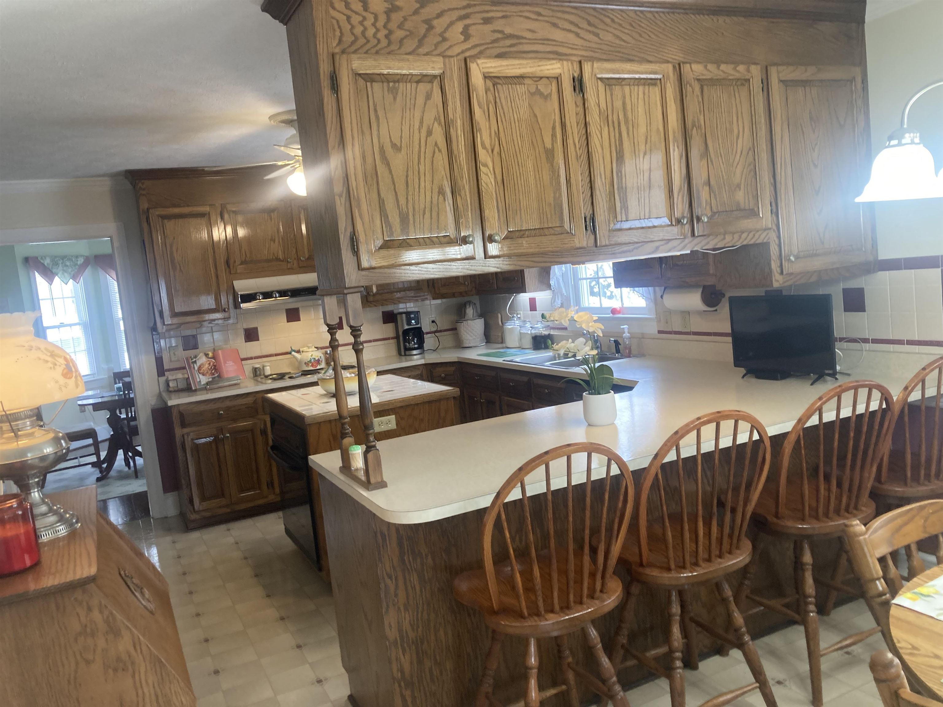 36 Spring Court Waynesboro, VA 22980 - Photo 22 of 72 a kitchen with stainless steel appliances a table and chairs in it