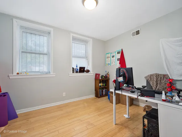 a room with furniture and gym equipment