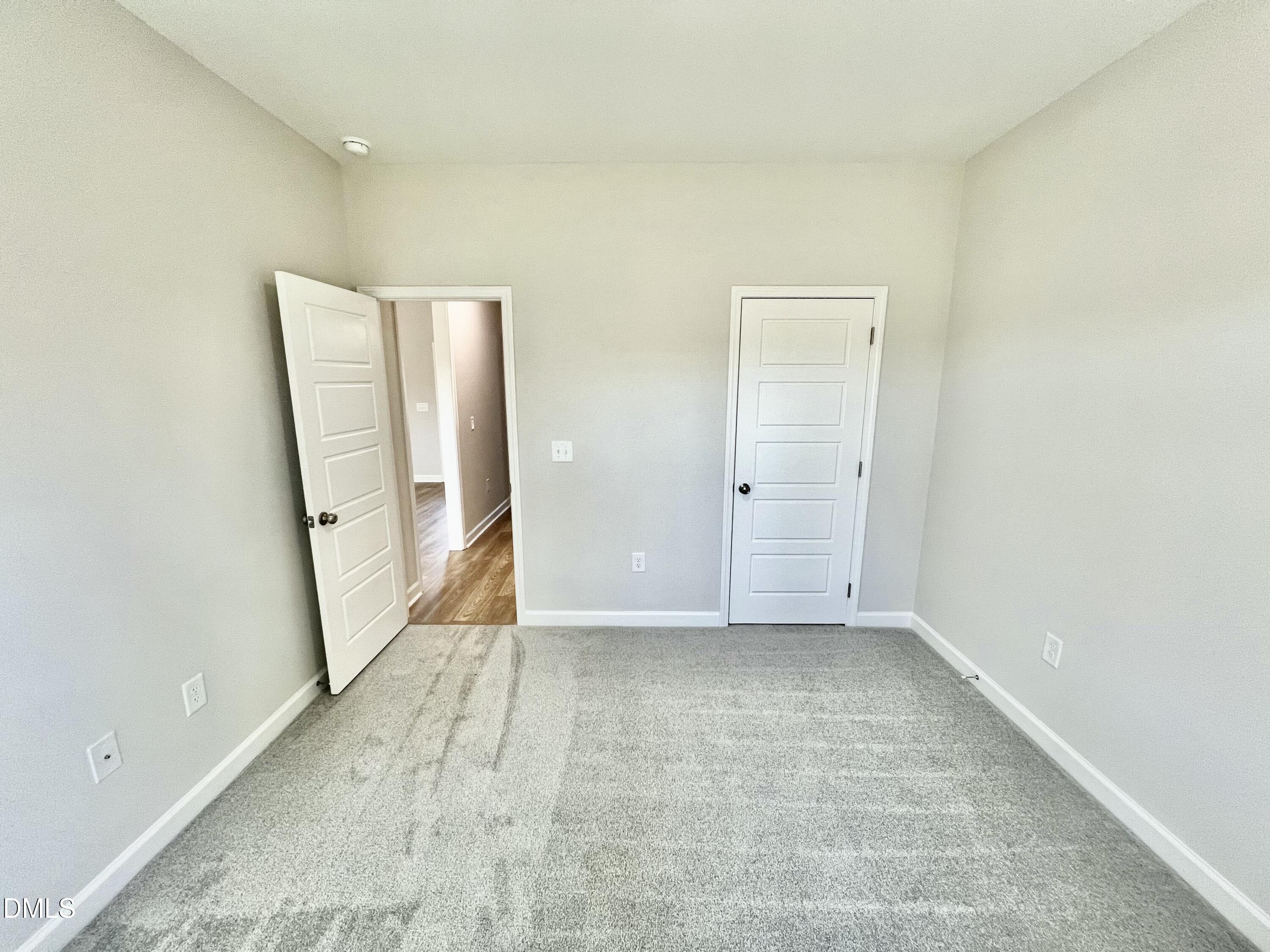 711 Polly Watson Road Fremont, NC 27830 - Photo 15 of 21 an empty room with a mirror