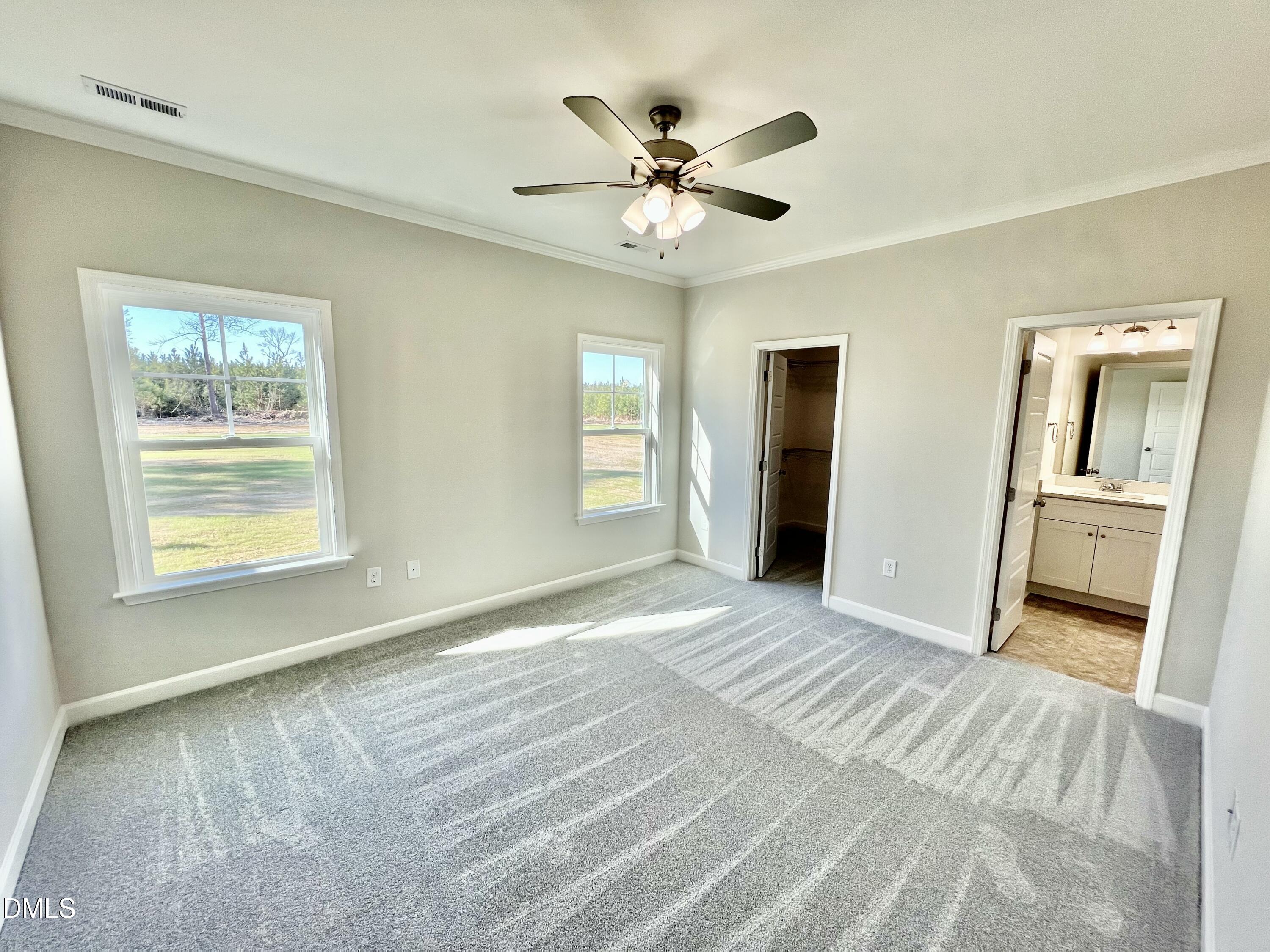 711 Polly Watson Road Fremont, NC 27830 - Photo 8 of 21 a view of an empty room with a window