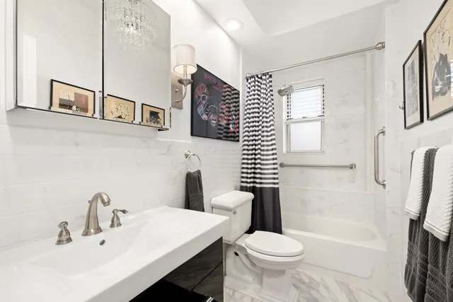 a room with furniture and a flat screen tv