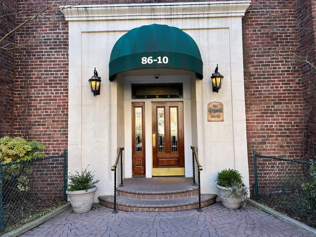 a kitchen with a stove and a sink