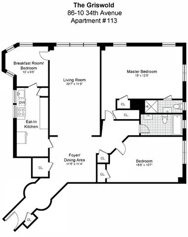 a bedroom with a bed couch and window