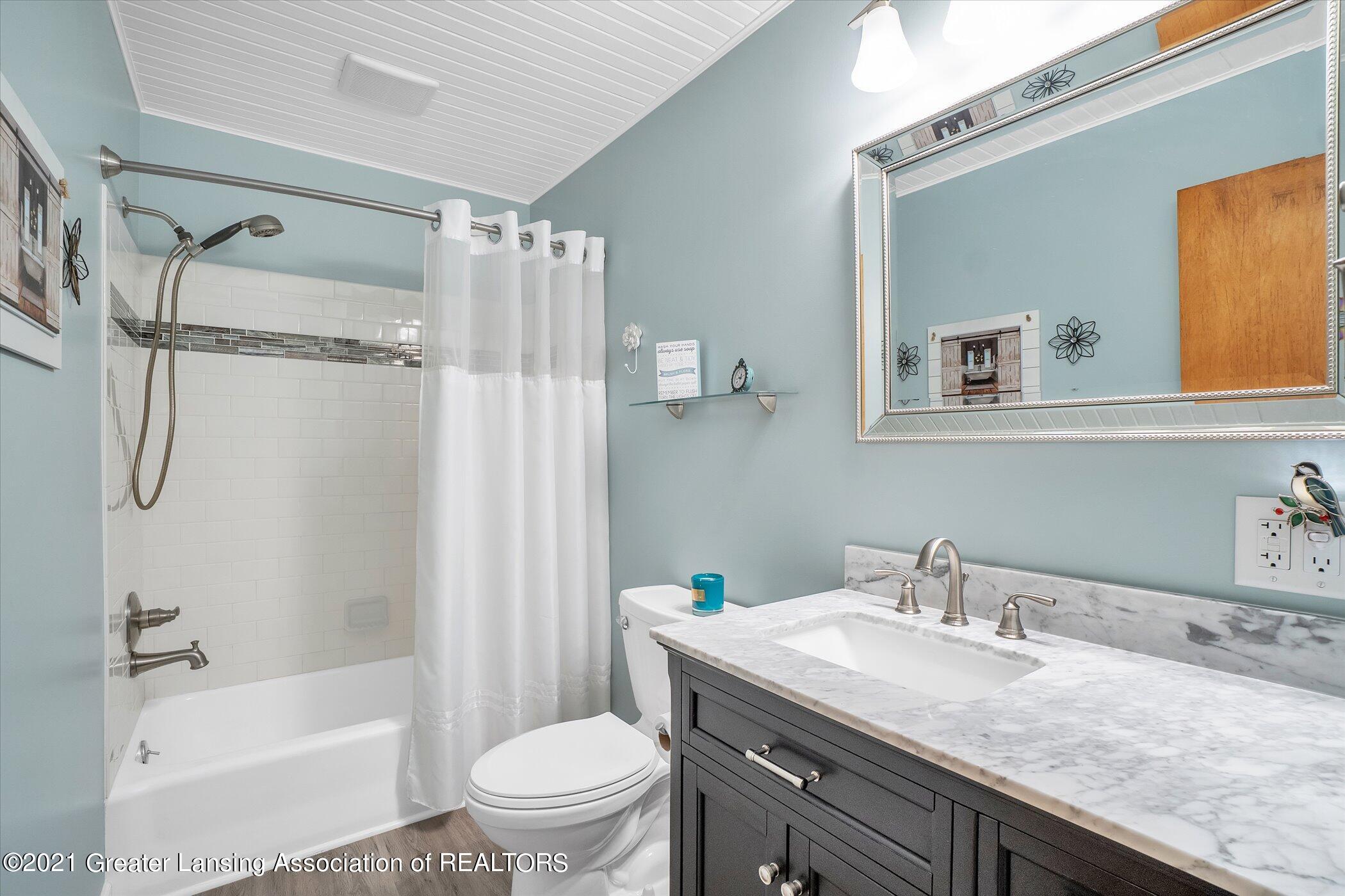 6212 Cooper Road Lansing, MI 48911 - Photo 19 of 51 19-6212-Cooper-Rd-Lansing-MI-48911-Windo