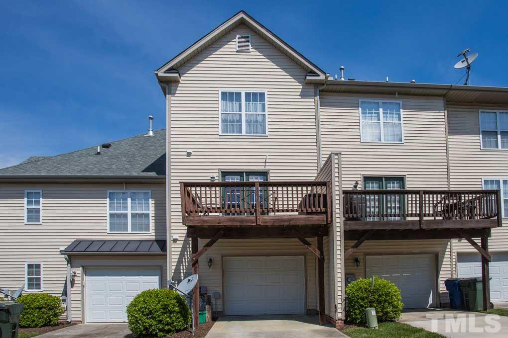 9712 Jordy Drive, Unit 291 Raleigh, NC 27617 - Photo 14 of 15 a front view of a house with a garage