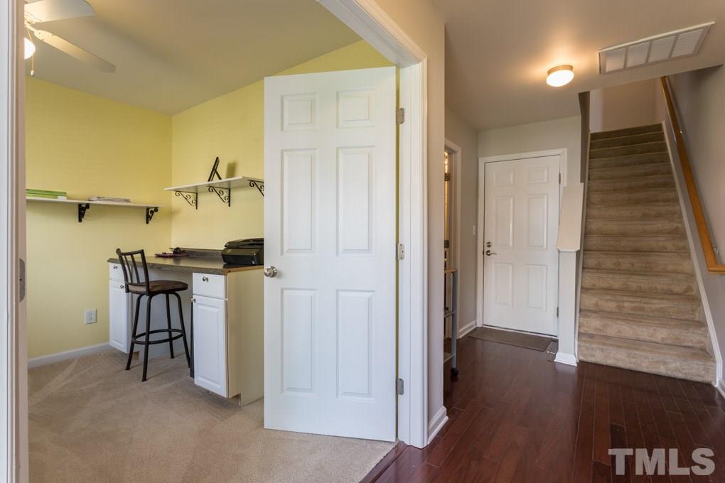 9712 Jordy Drive, Unit 291 Raleigh, NC 27617 - Photo 3 of 15 a view of hallway with wooden floor