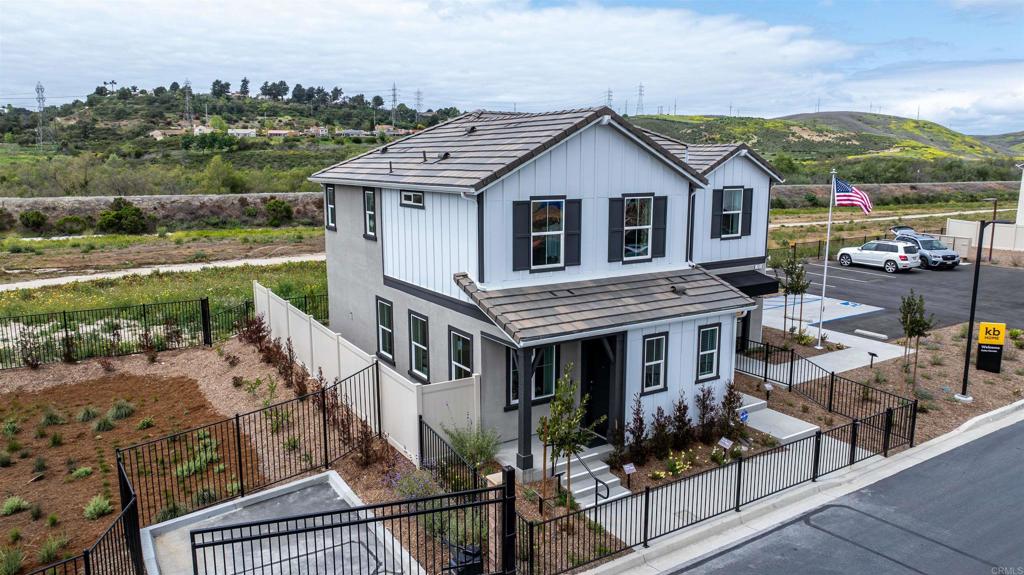 707 Kingbird Loop Oceanside, CA 92058 - Photo 5 of 7 a view of house and outdoor space
