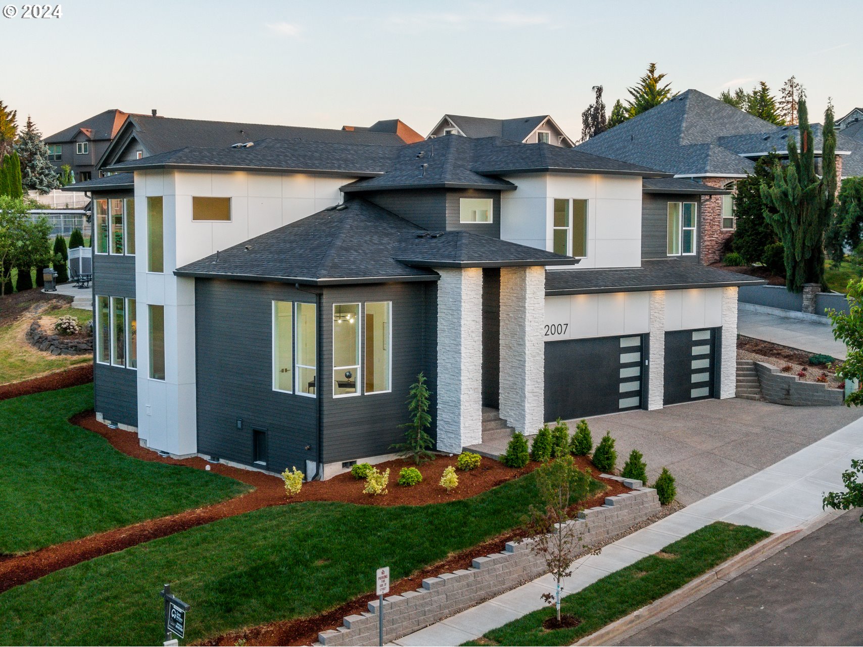 2007 South 16th Drive Ridgefield, WA 98642 - Photo 4 of 48 a front view of a house with a yard