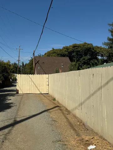 a view of a road with a yard