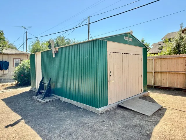 a view of a balcony with wooden floor