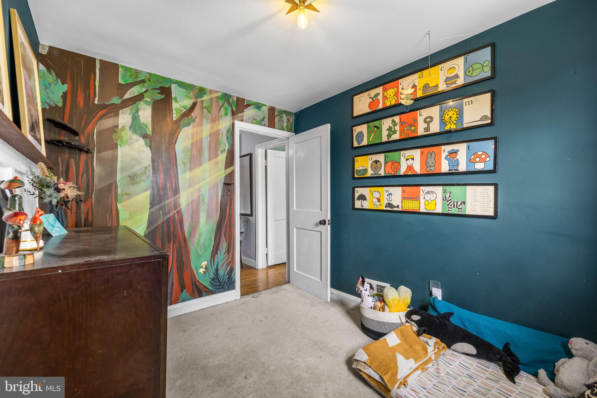 1620 Hardwick Road Towson, MD 21286 - Photo 19 of 38 a bedroom with a bed and a book shelf