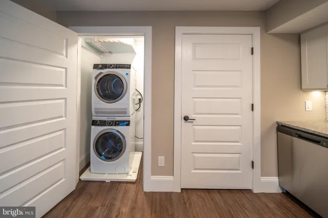 a bathroom with a toilet a sink and shower